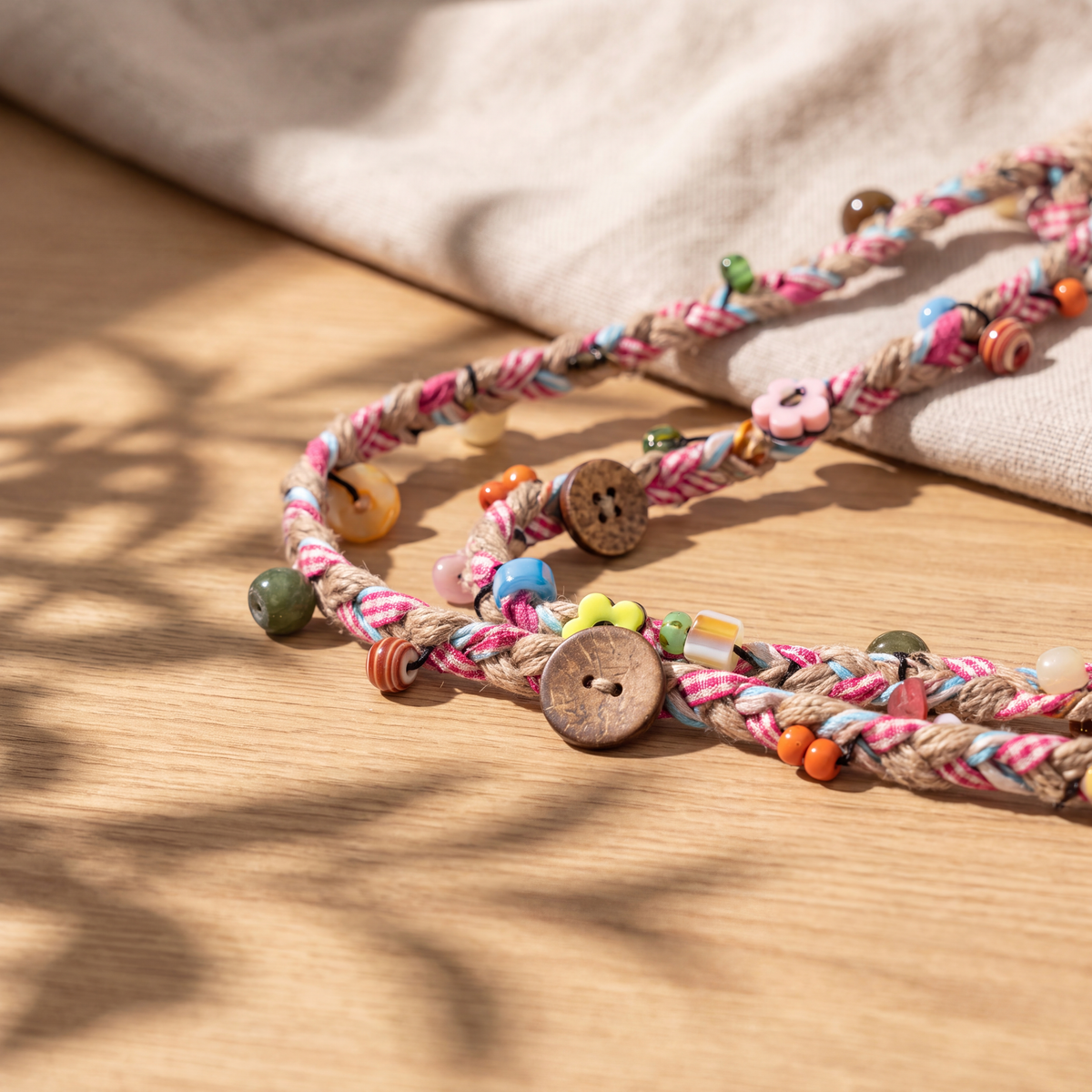 Pastel Woven Crossbody Phone Strap with Leaf Charm & Wooden Buttons